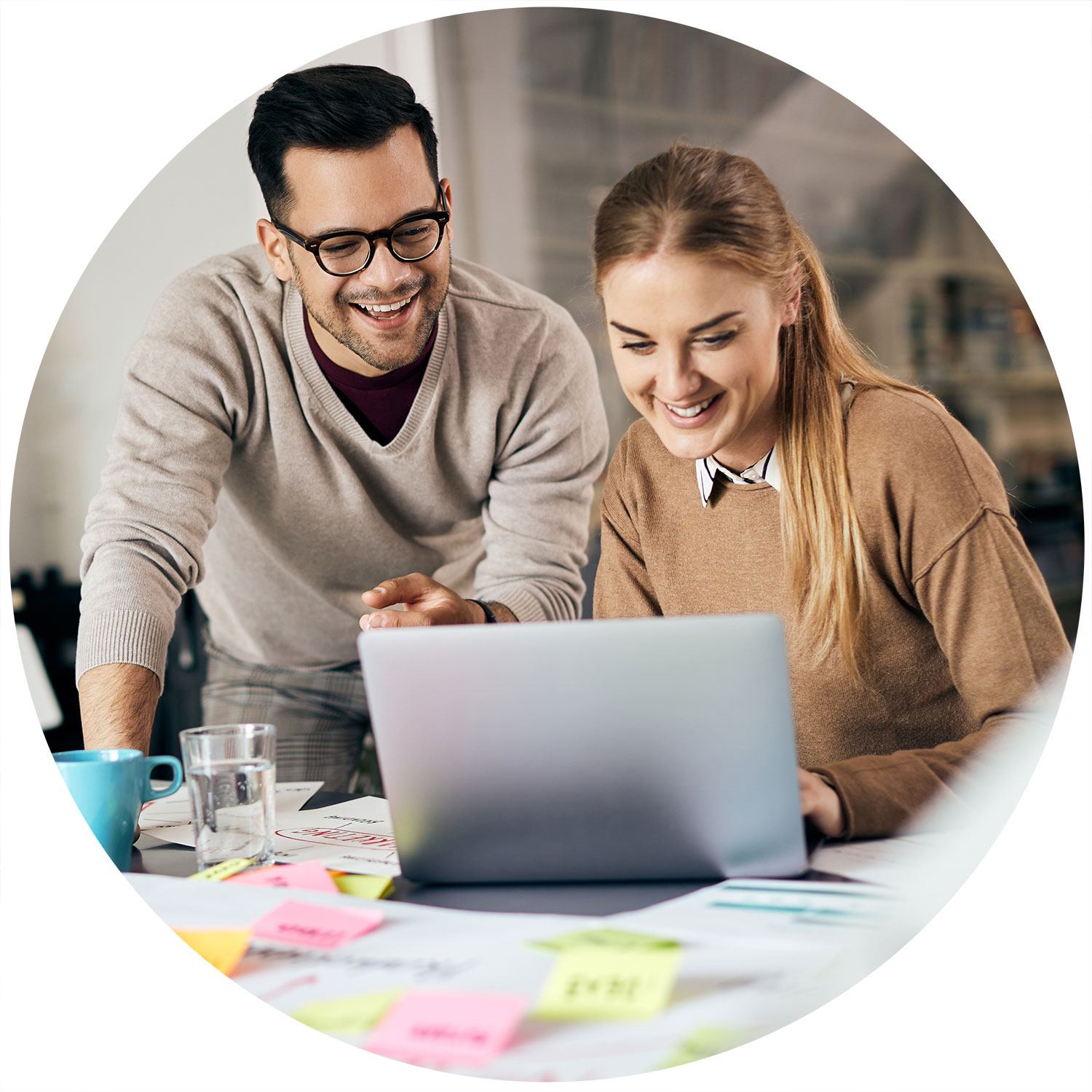 young-happy-freelancers-cooperating-while-working-2024-12-13-23-02-22-utc